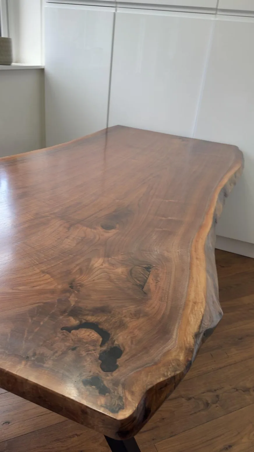 Handcrafted natural-edge timber tabletop