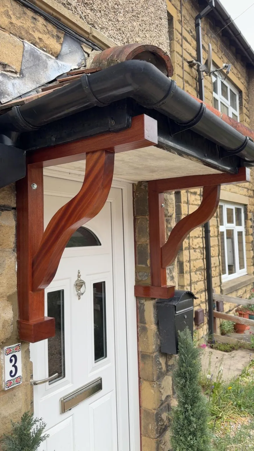 Bespoke timber entrance canopy and supporting frame