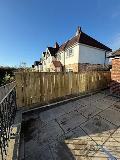New timber garden fence around a residential property