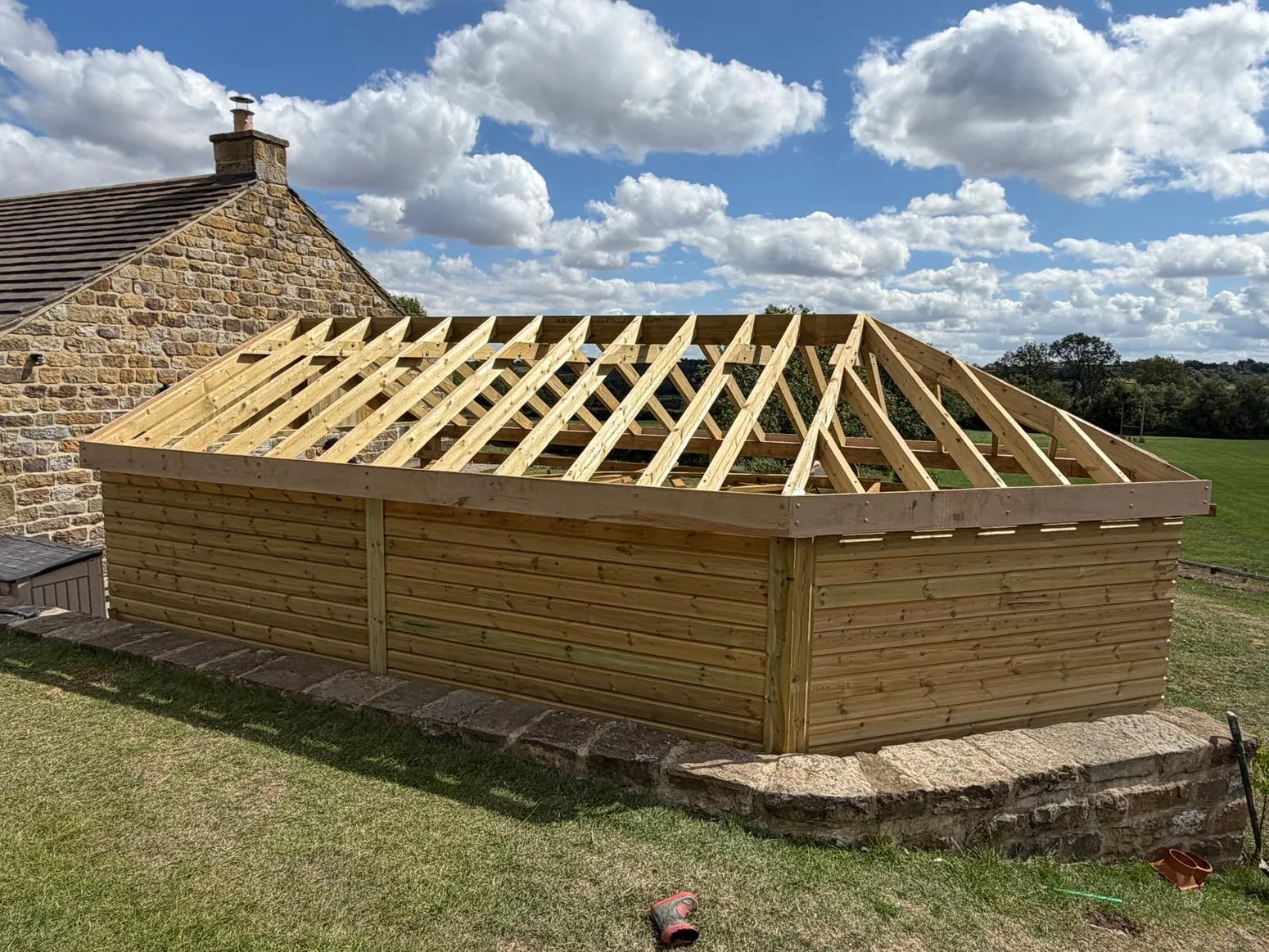 Timber roof structure fitted to garden building