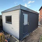 Light grey clad garden room with glazed window